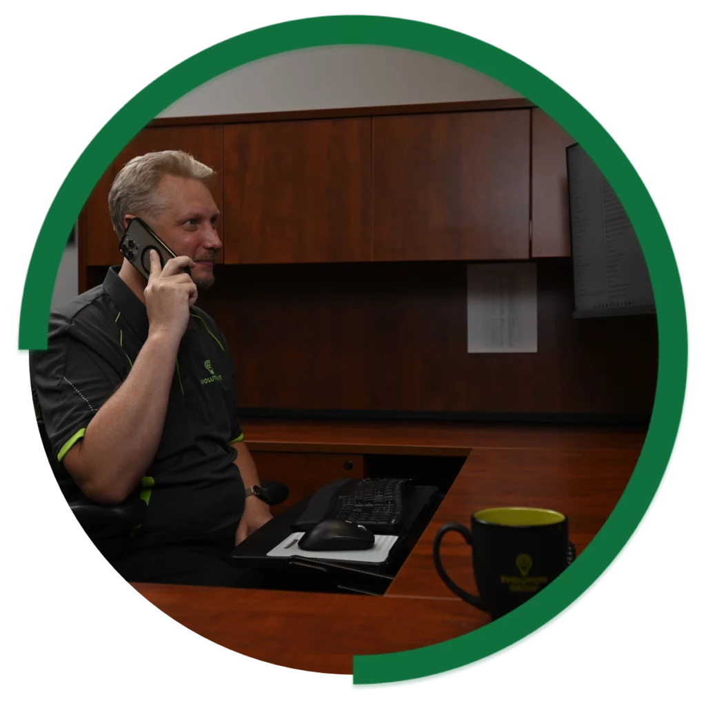 Evolution Group Team Member on phone