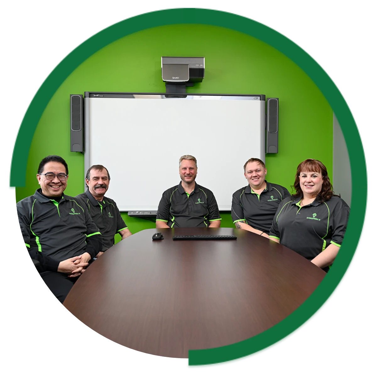 Team sitting at meeting table